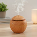 Diffuseur ultrasonique en bois, brume en action, lumière douce